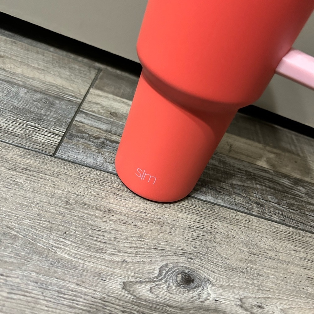 40 oz Simple Modern Trek Tumbler featuring a pink handle and a coral-colored - Picture 2 of 6